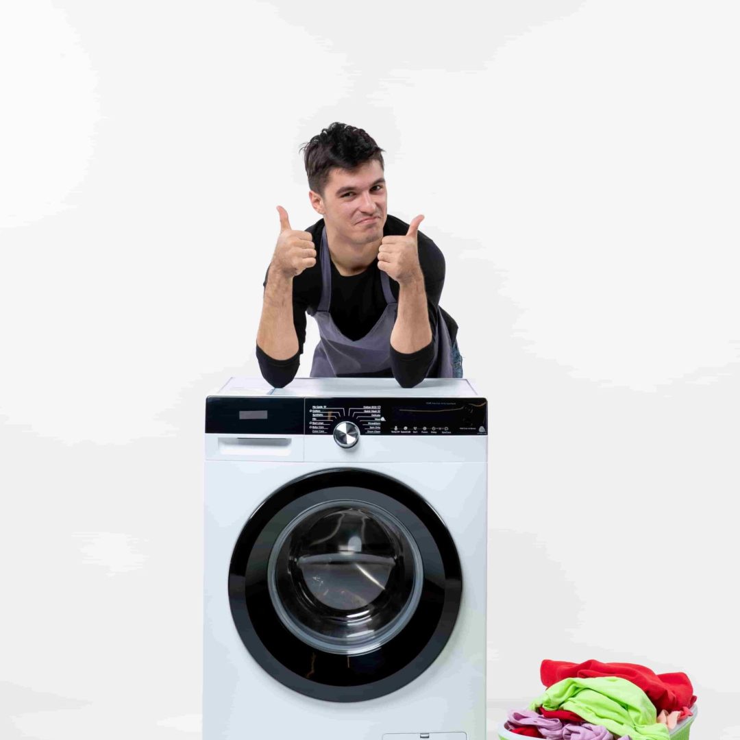 front-view-young-male-with-washer-dirty-clothes-white-wall-min